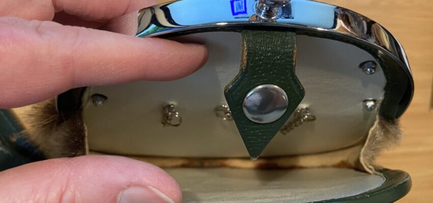 Those white spots on the leather are just the light hot spots. The leather is in perfect shape.